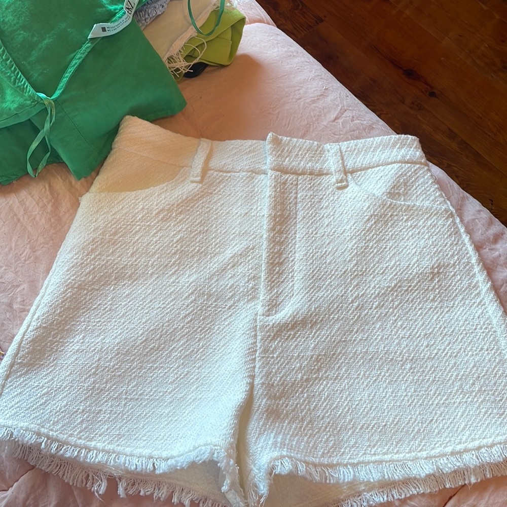 White Zara shorts.